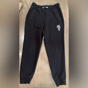 Black youth size M GOAT joggers.